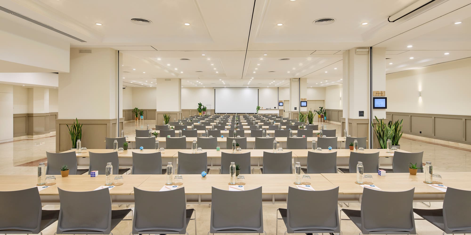 a room with tables and chairs