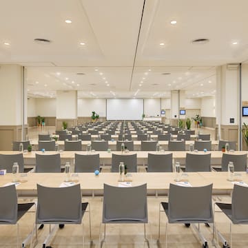 a room with tables and chairs