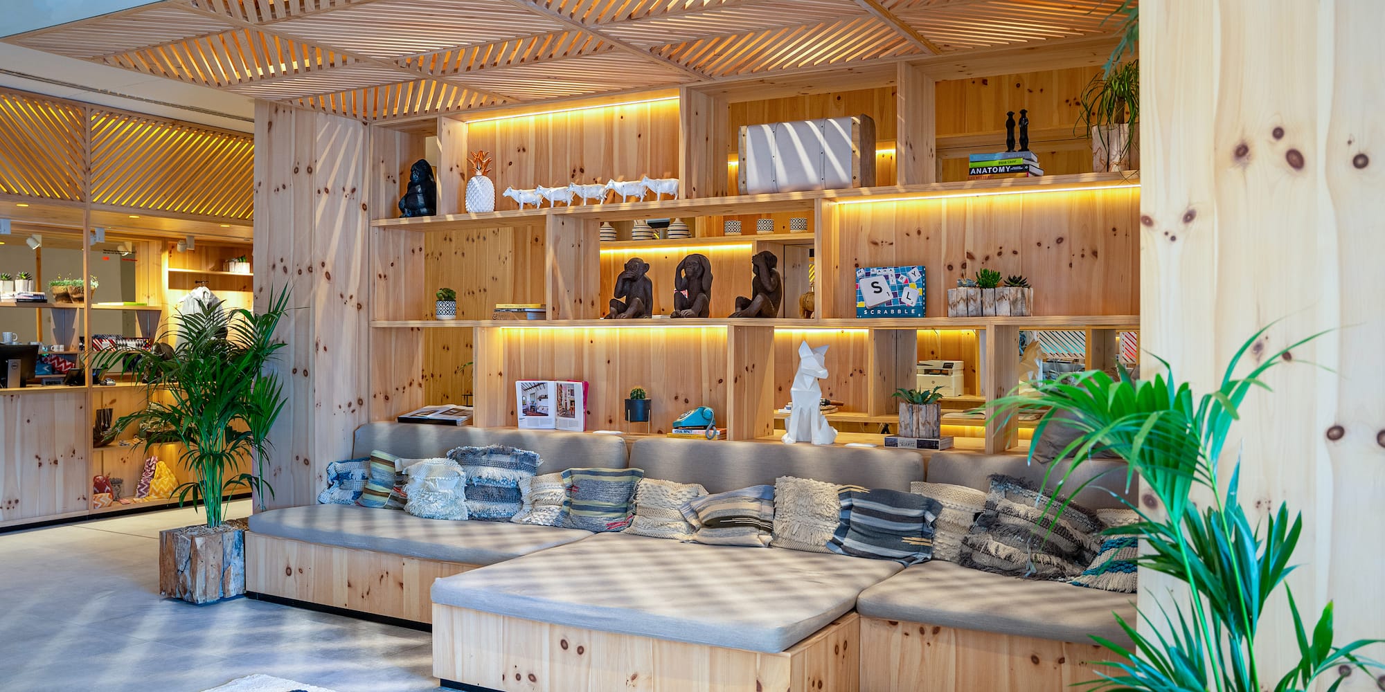 a room with a couch and shelves