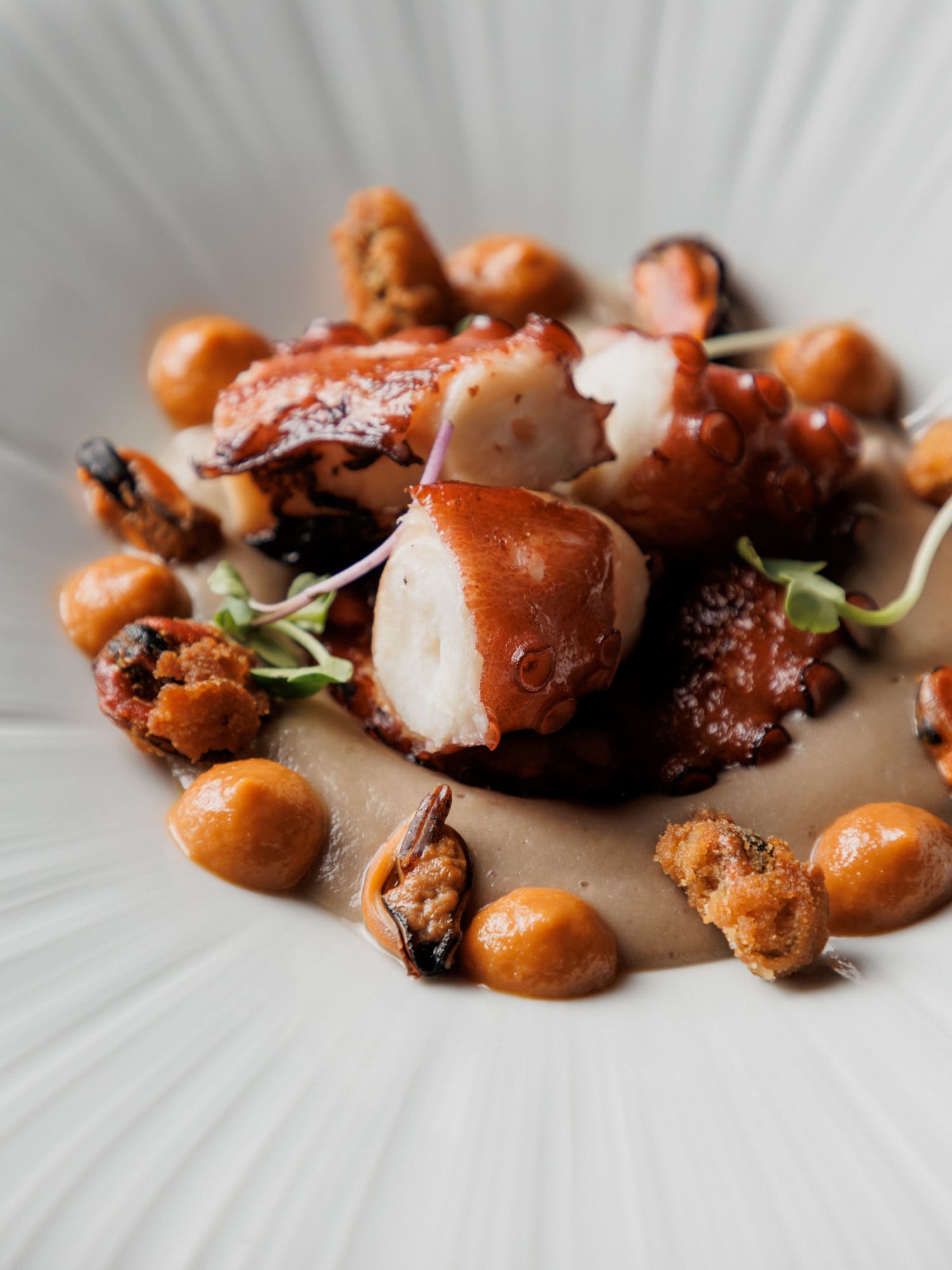 a plate of food with a white surface