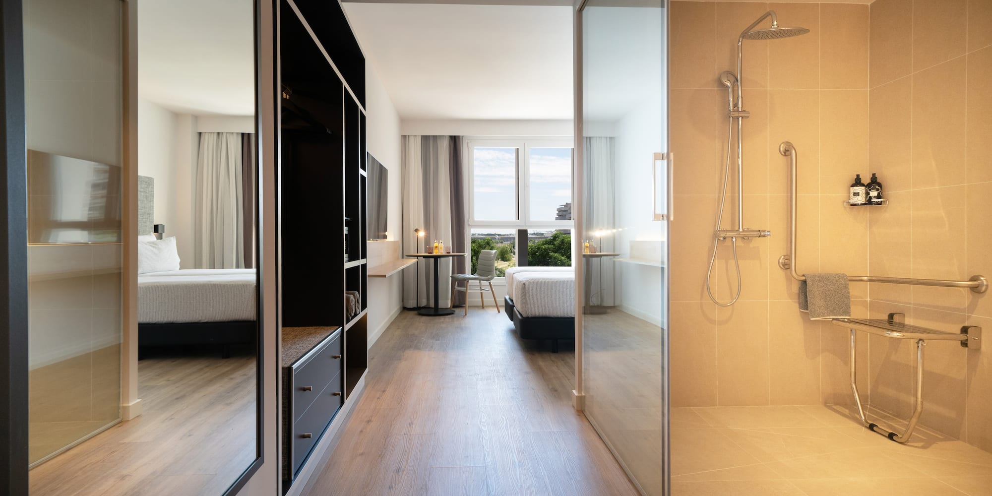 a bathroom with a shower and a bed