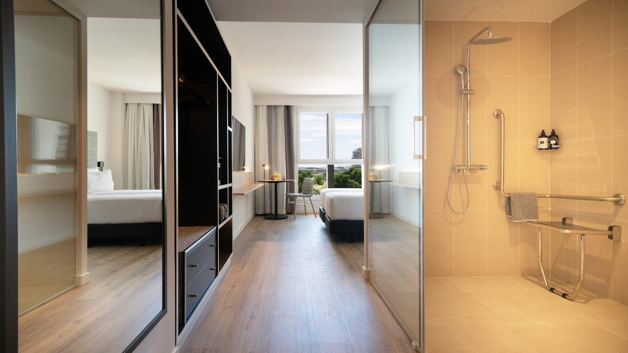 a bathroom with a shower and a bed