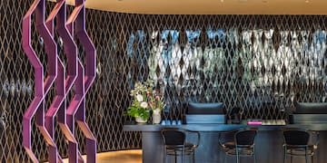 a room with a table and chairs