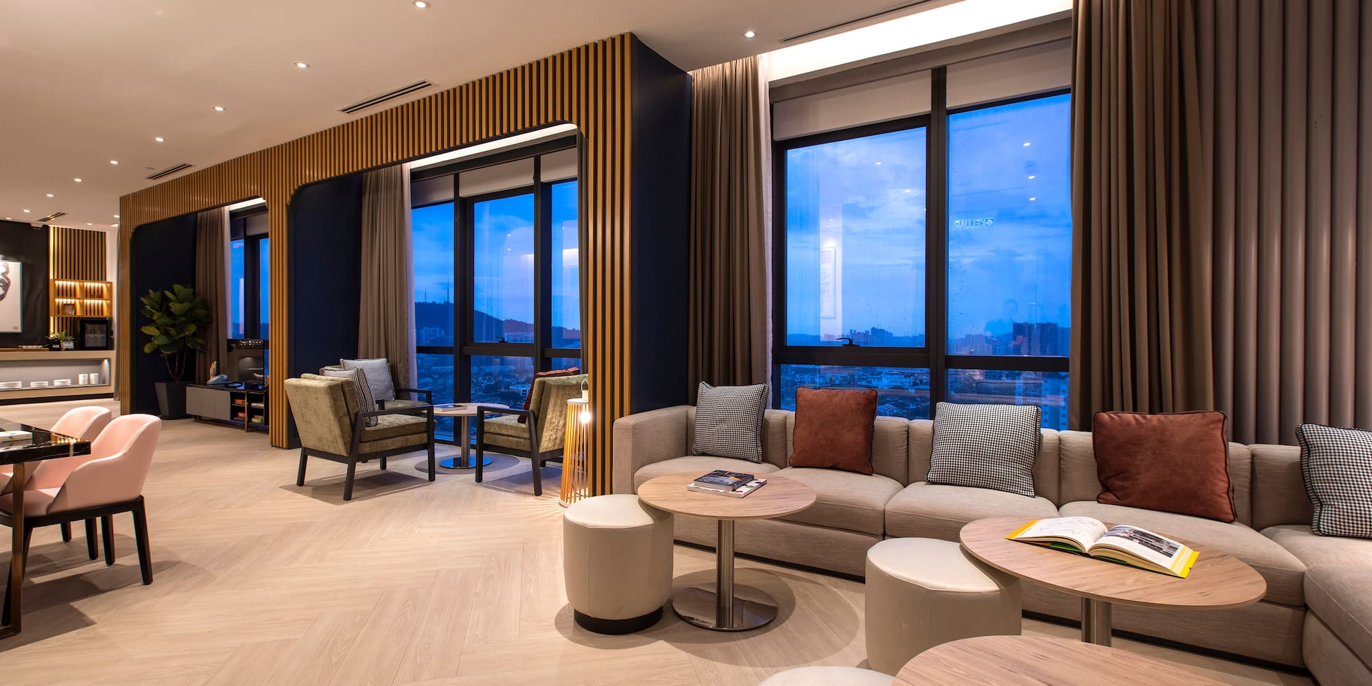 a room with a couch and tables