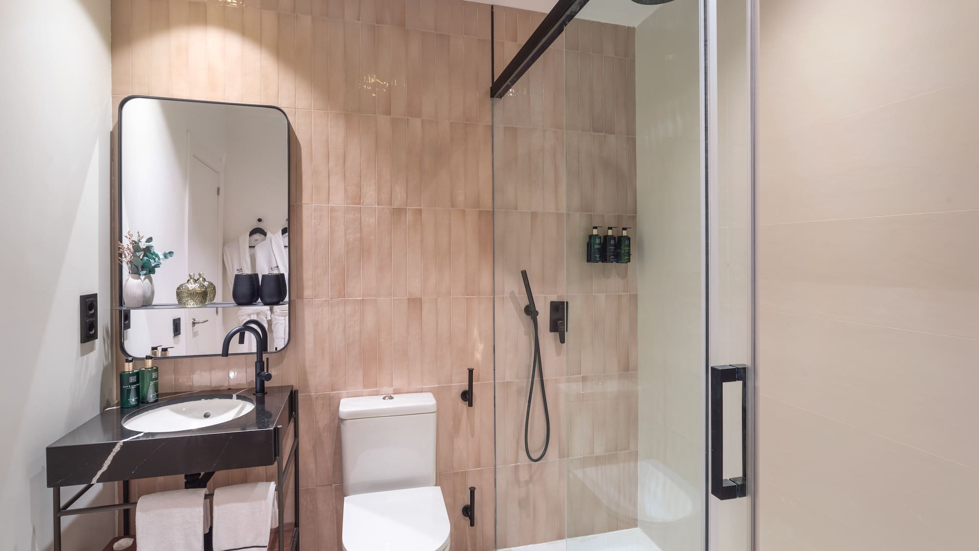a bathroom with a shower and toilet