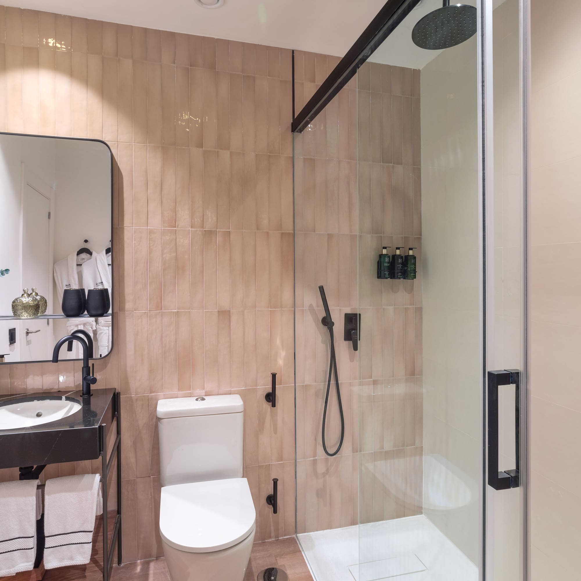 a bathroom with a shower and toilet