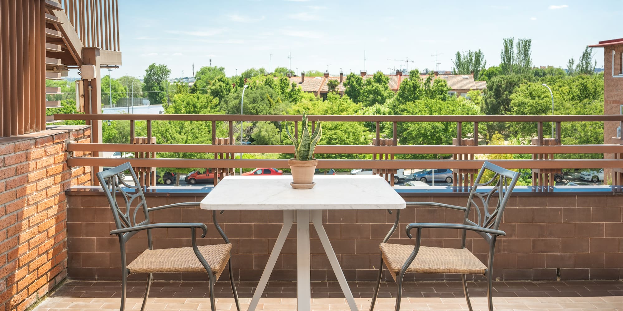 a table and chairs on a patio