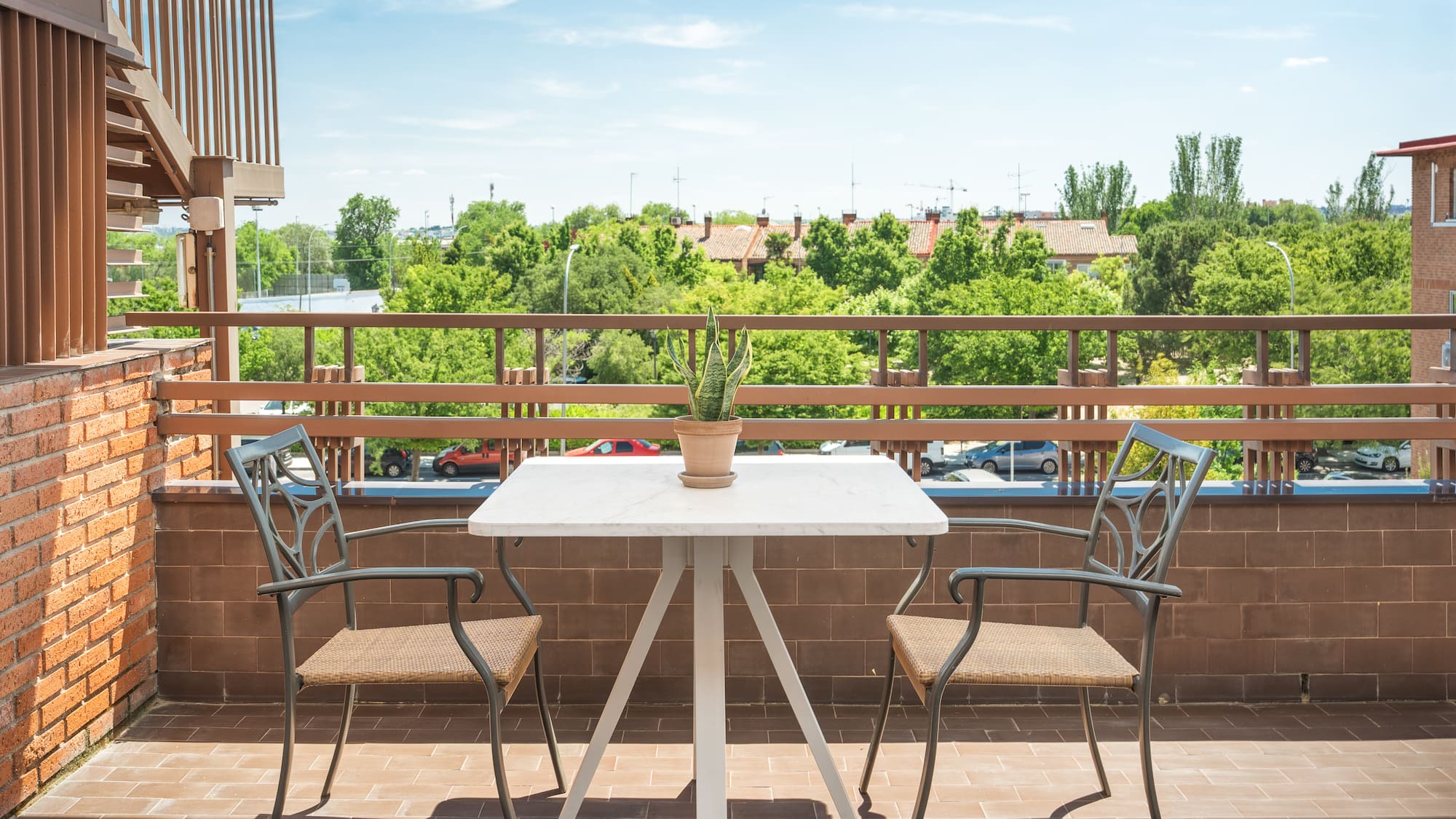 a table and chairs on a patio