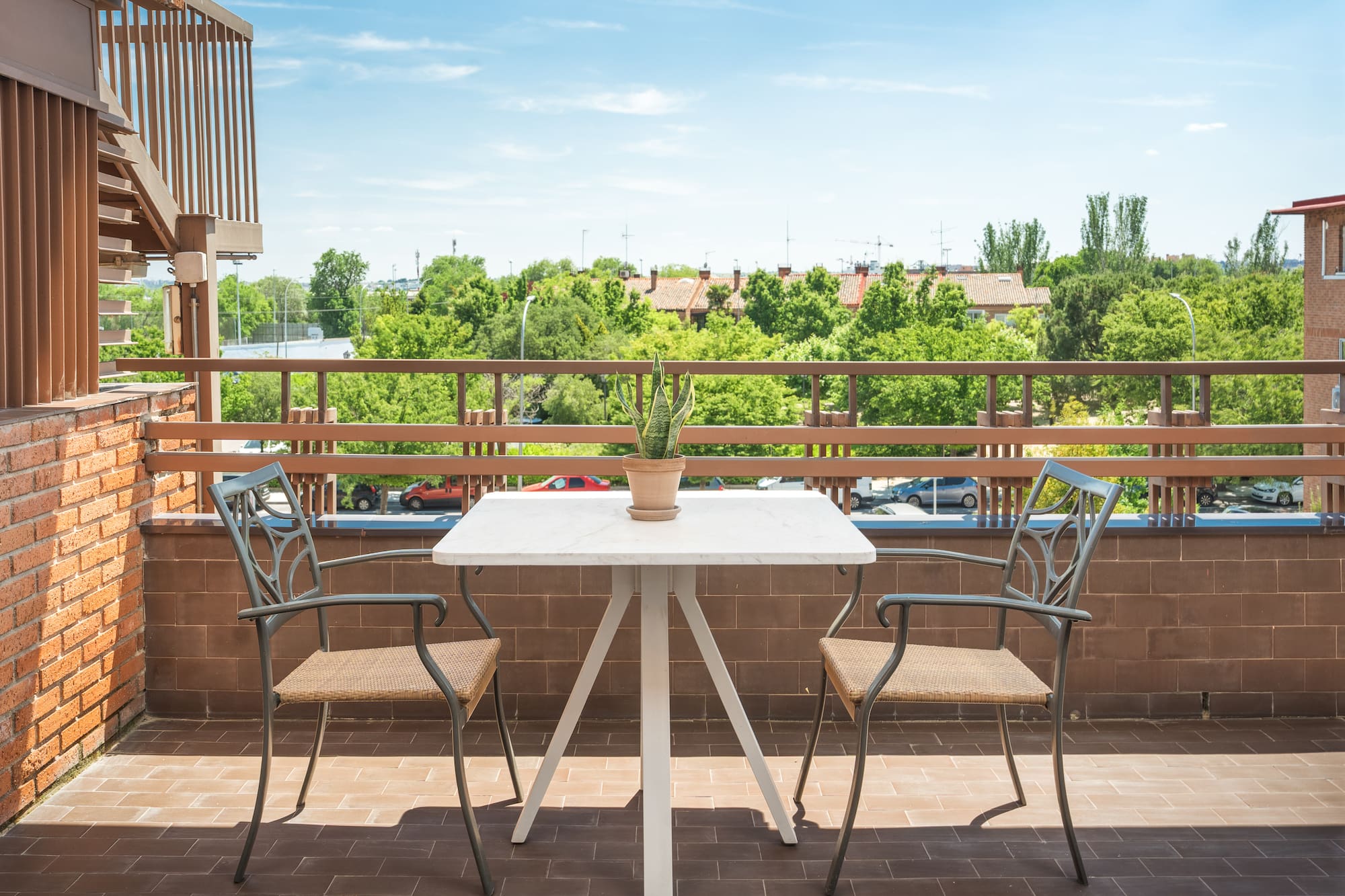 a table and chairs on a patio