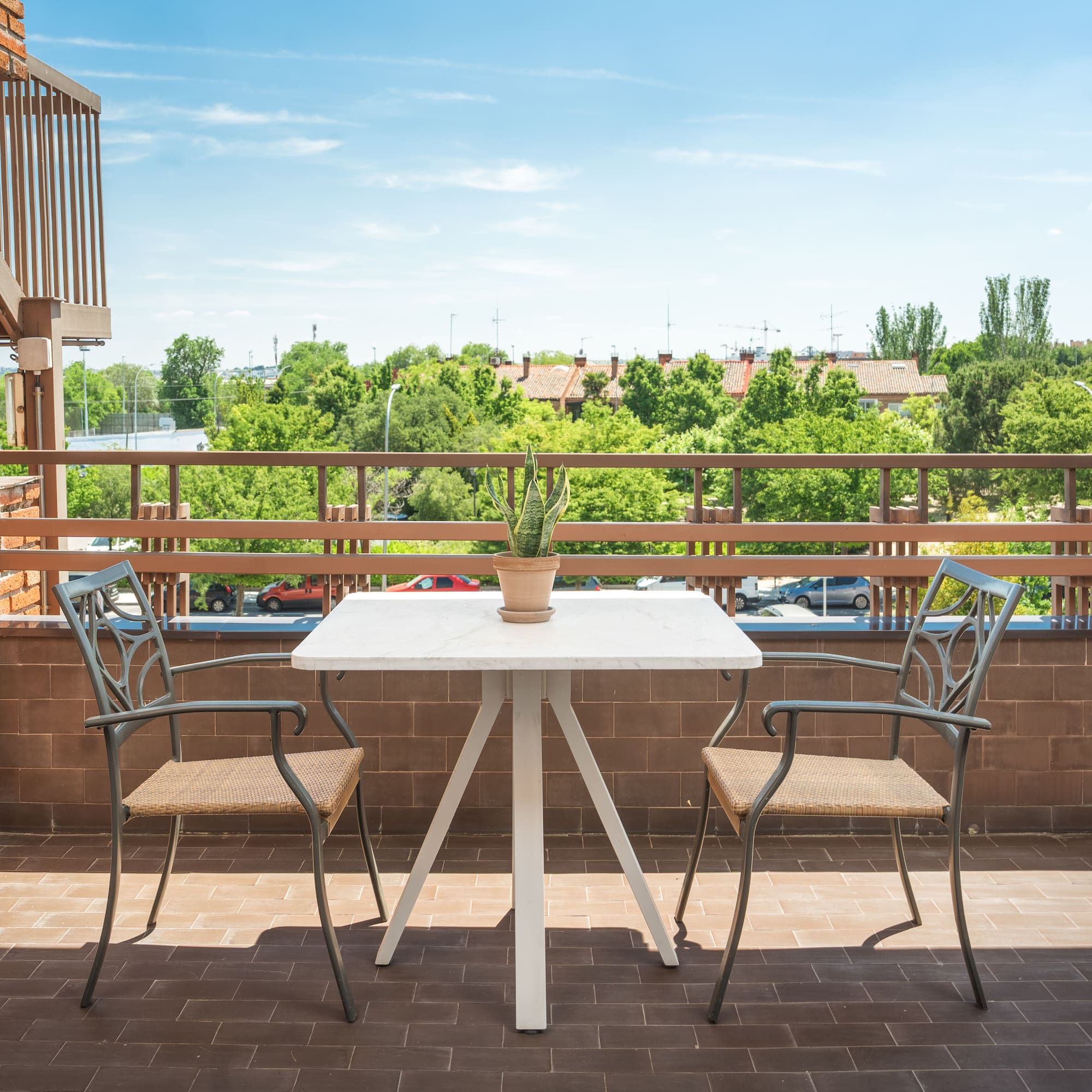 a table and chairs on a patio