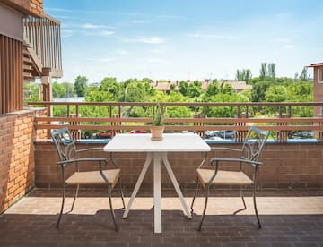 a table and chairs on a patio