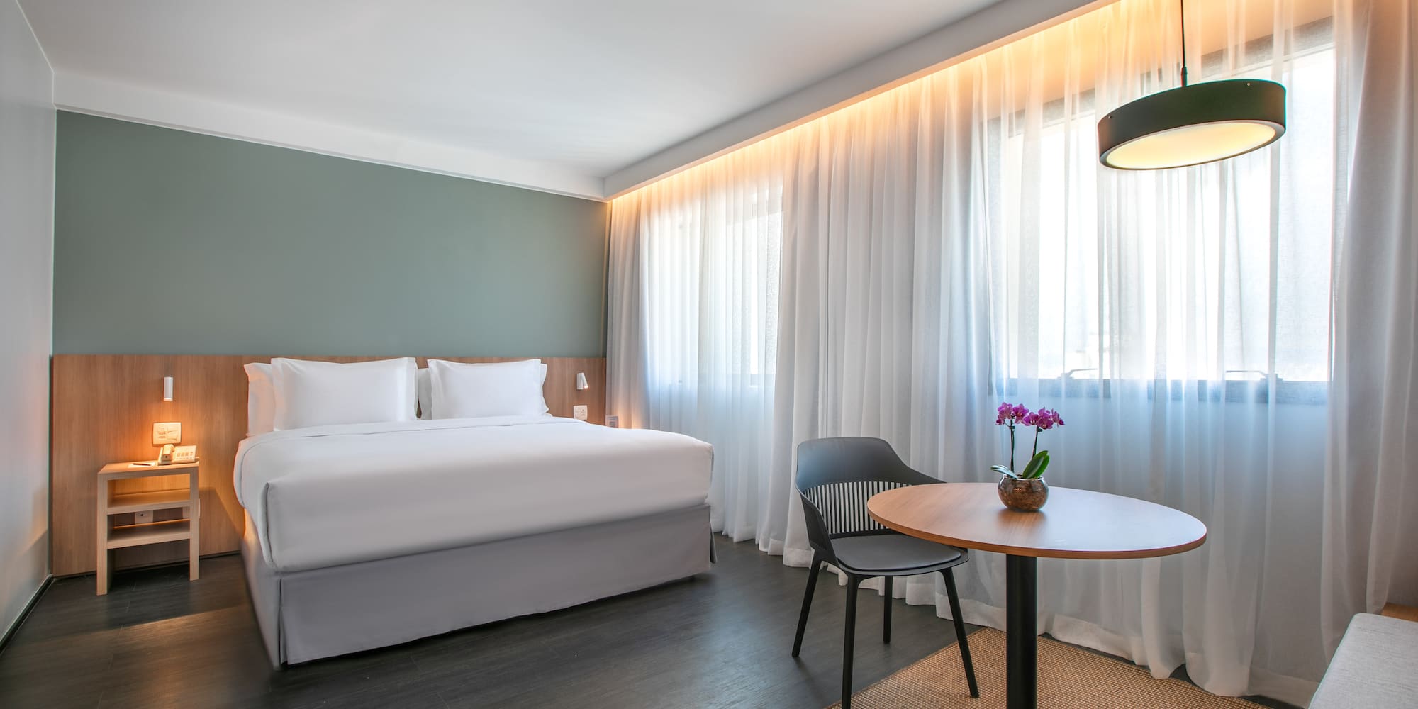 a room with a bed and a table