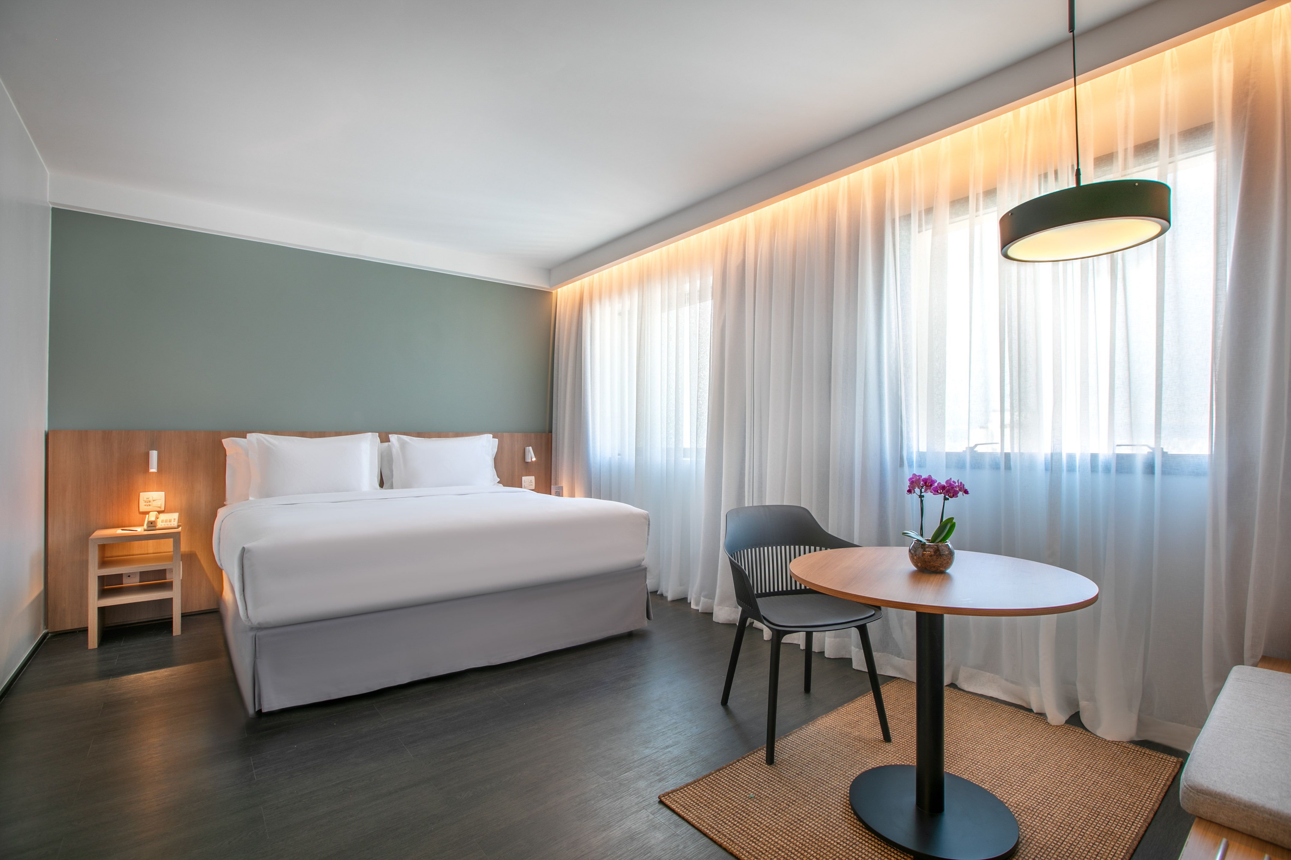 a room with a bed and a table