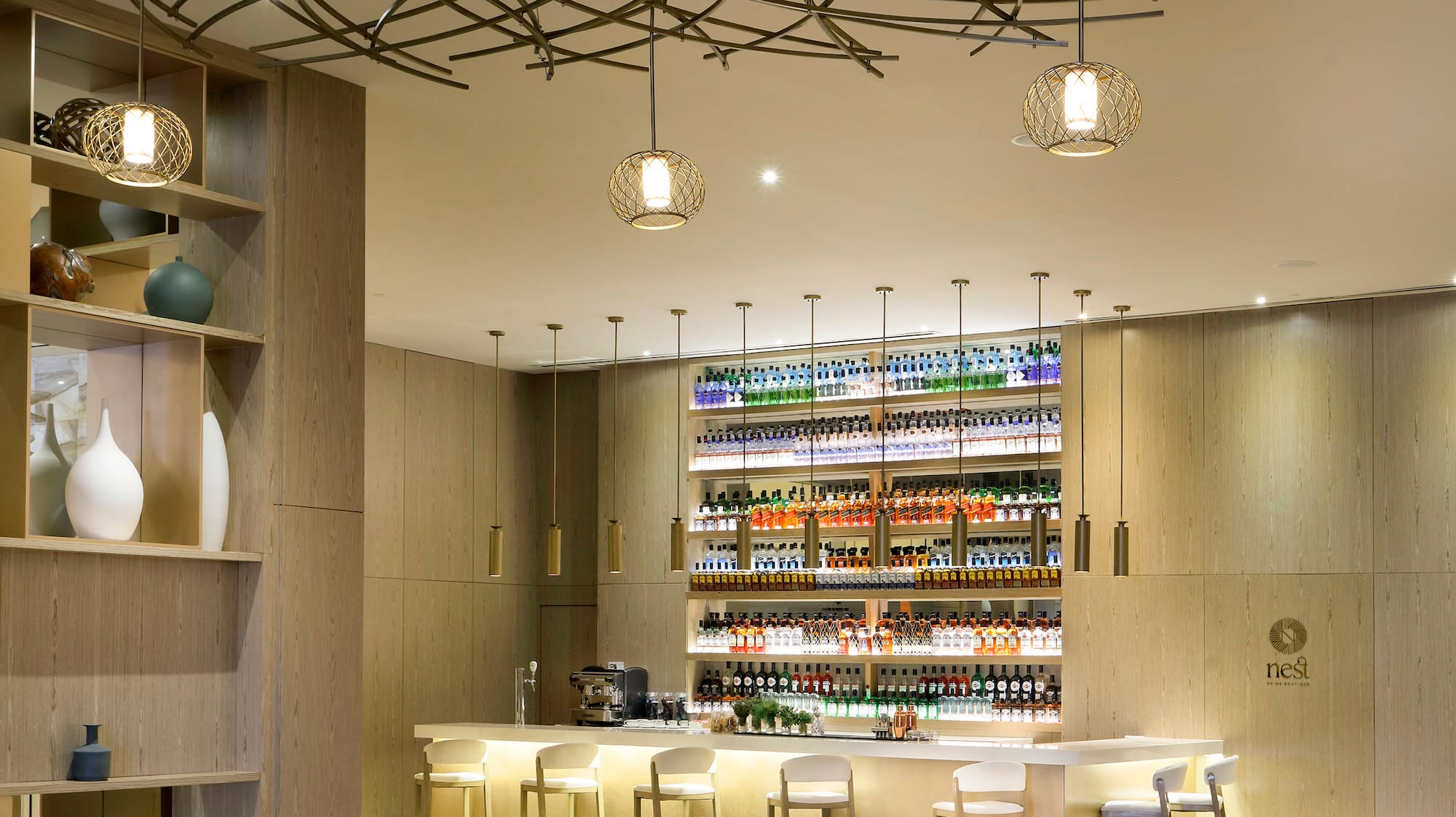 a room with a bar and a table