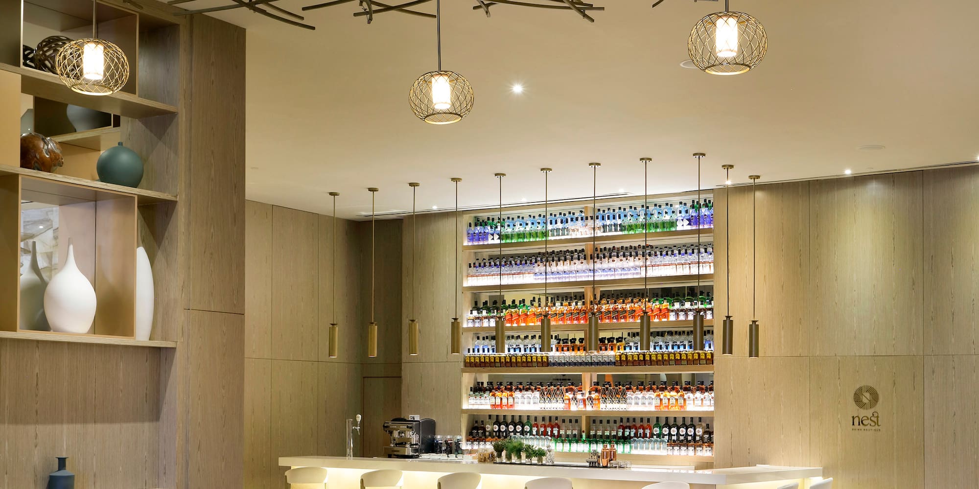 a room with a bar and a table