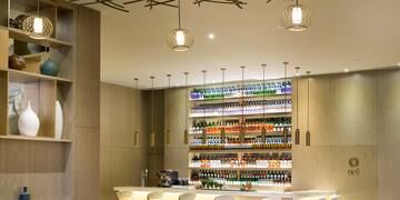 a room with a bar and a table