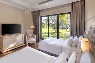 a room with a television and a bed