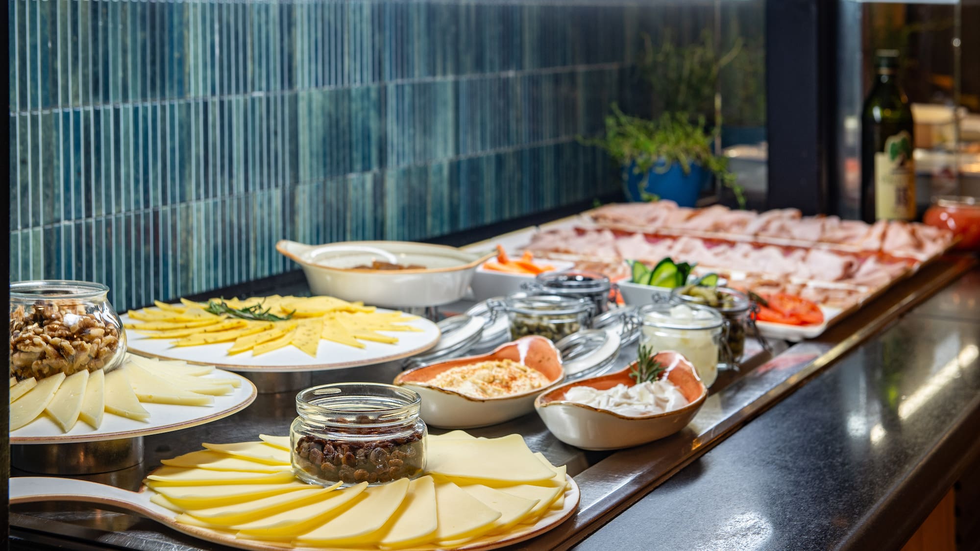 a buffet table with different food items on it