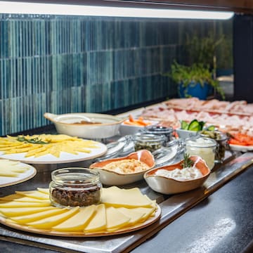 a buffet table with different food items on it
