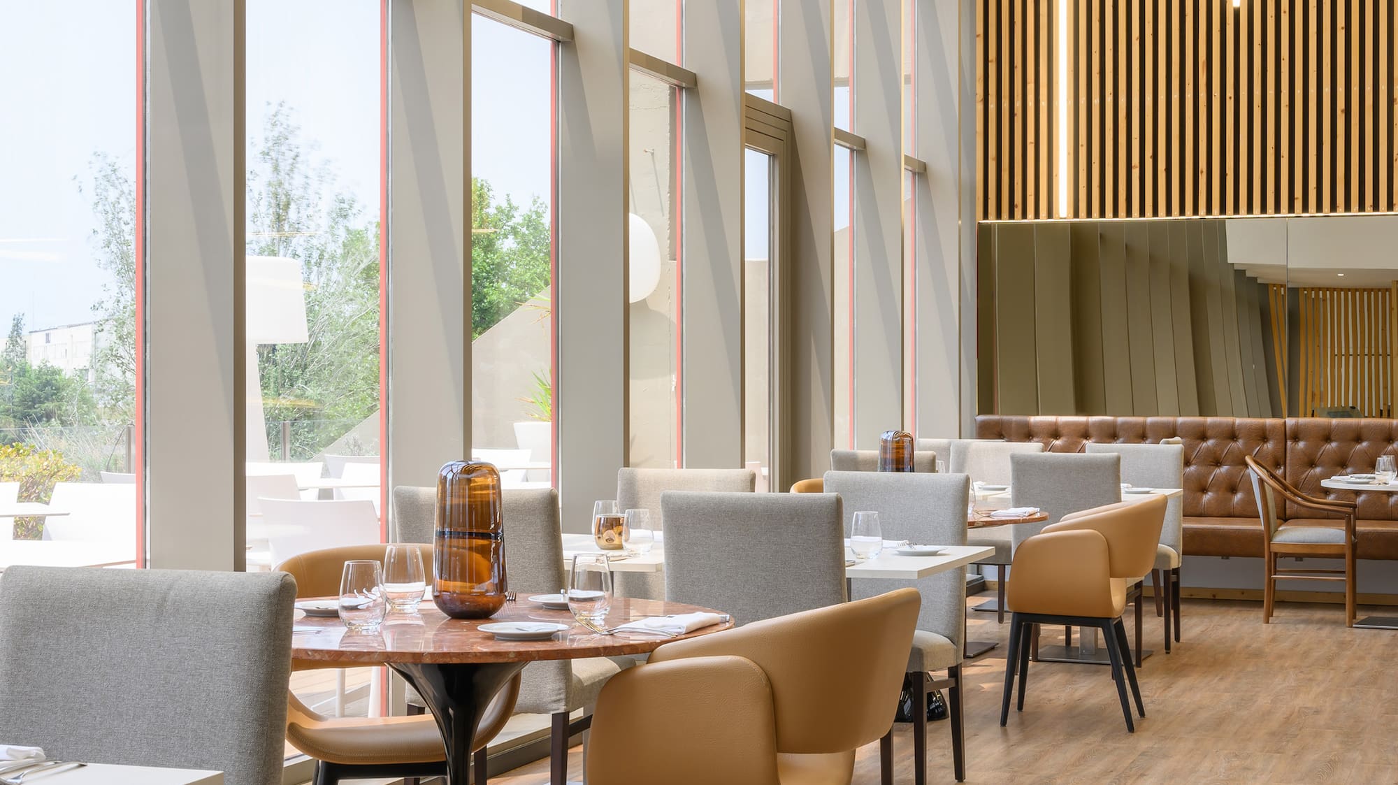 a restaurant with tables and chairs