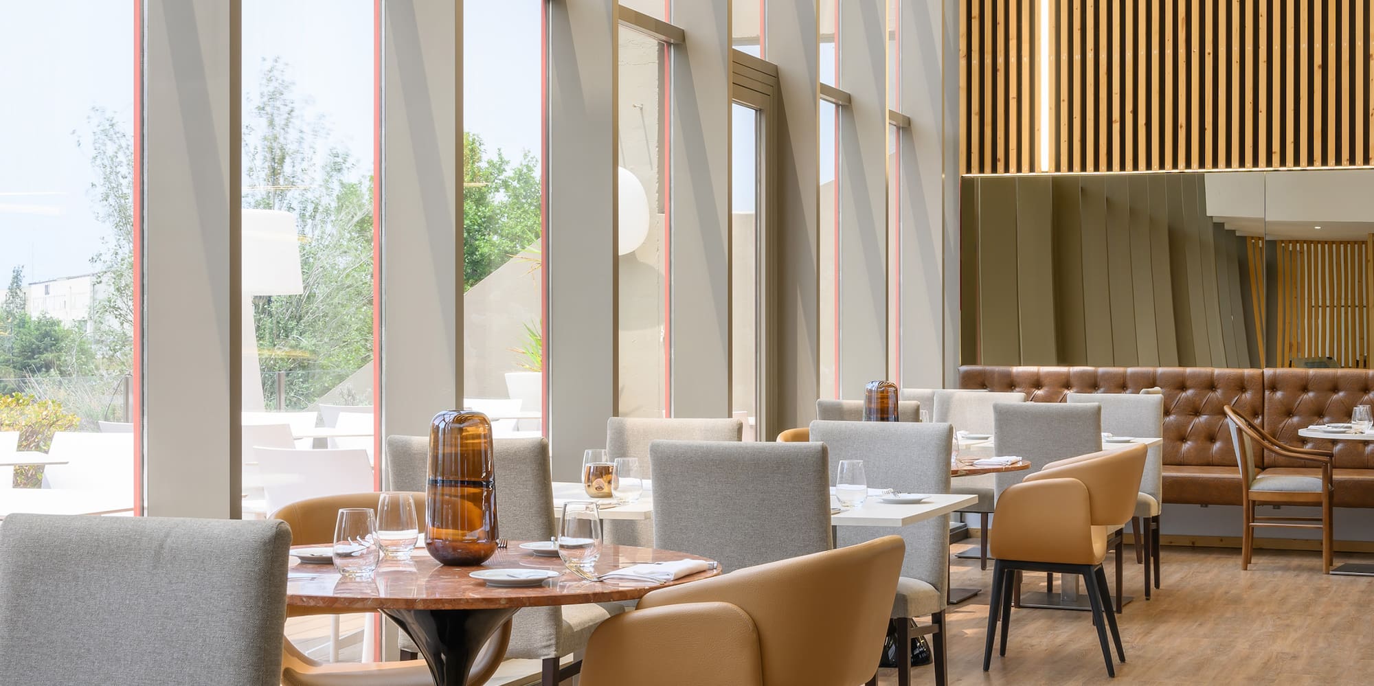 a restaurant with tables and chairs