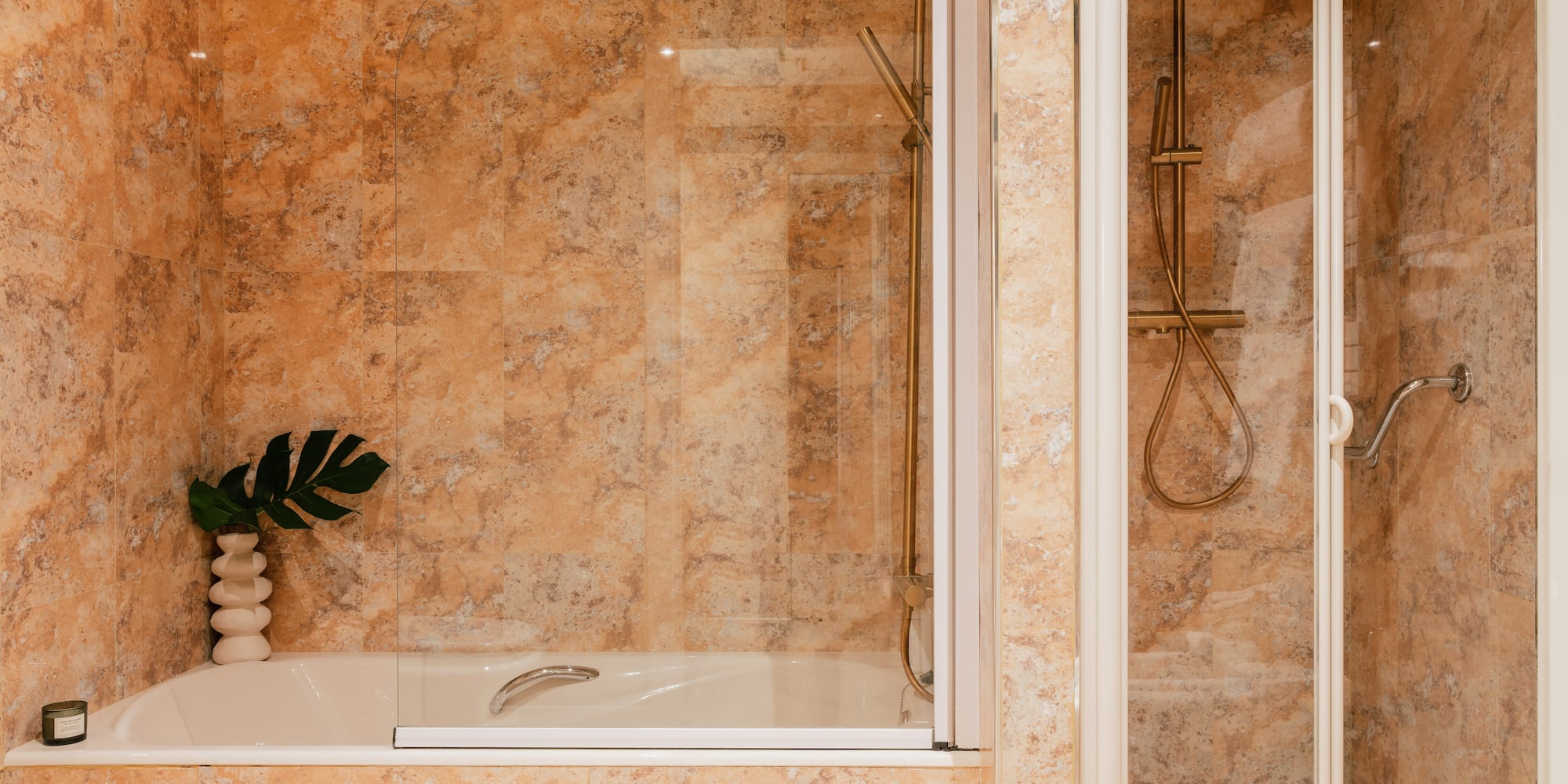 a shower and bathtub in a bathroom