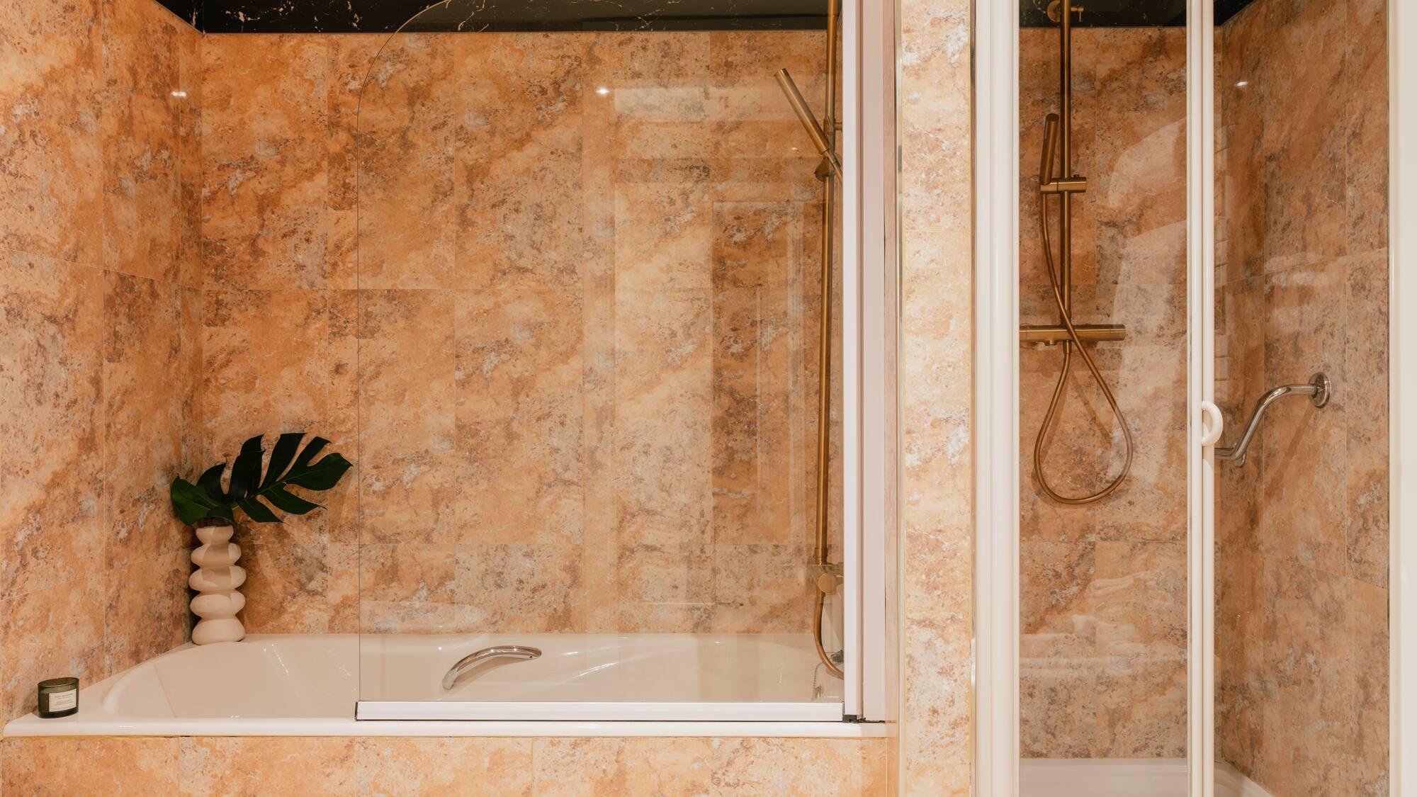 a shower and bathtub in a bathroom