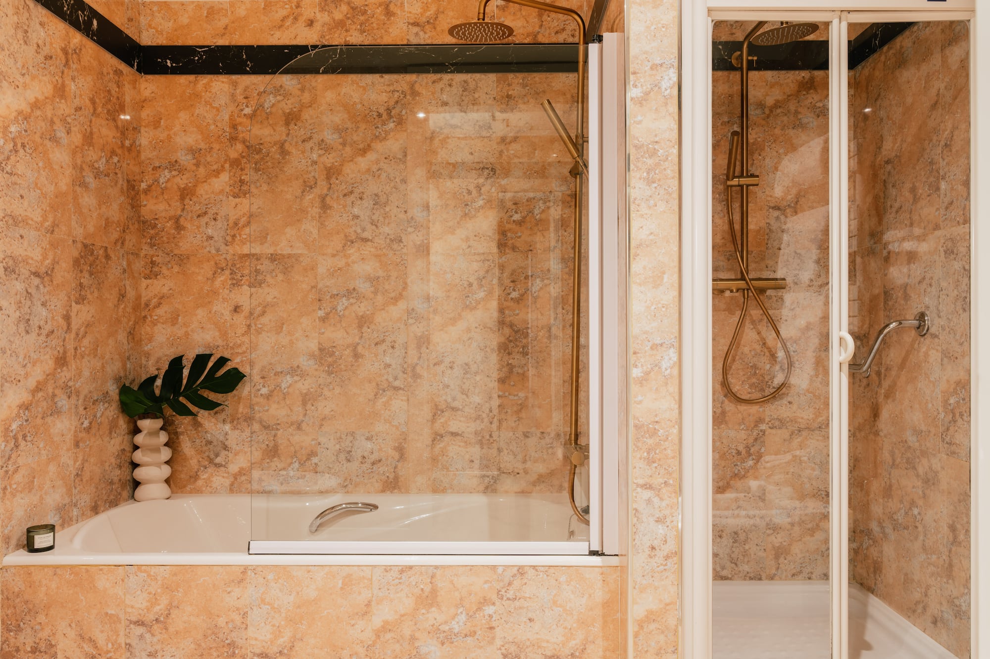 a shower and bathtub in a bathroom