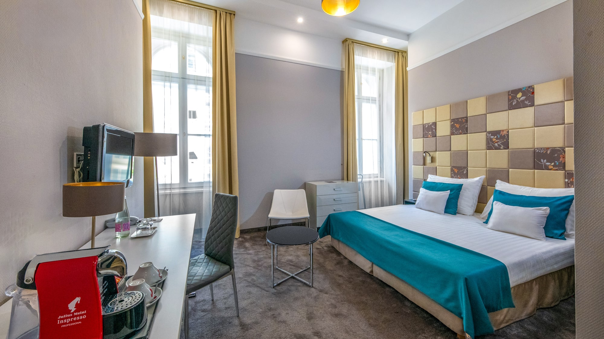 a room with a bed and a table