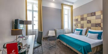 a room with a bed and a table