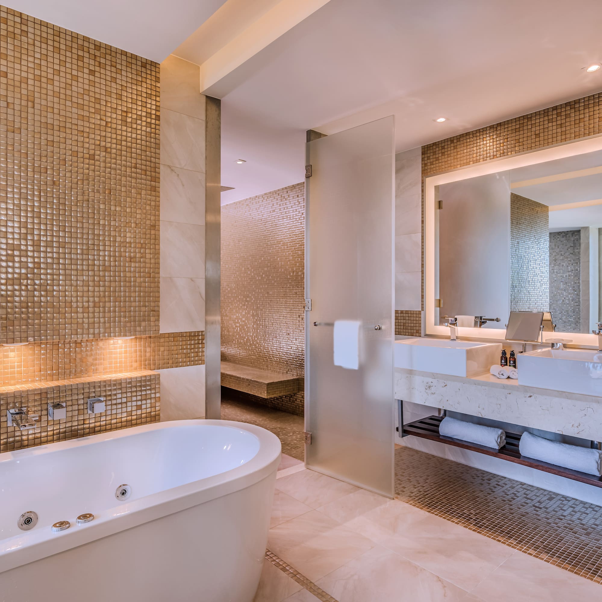 a bathroom with a tub and sink