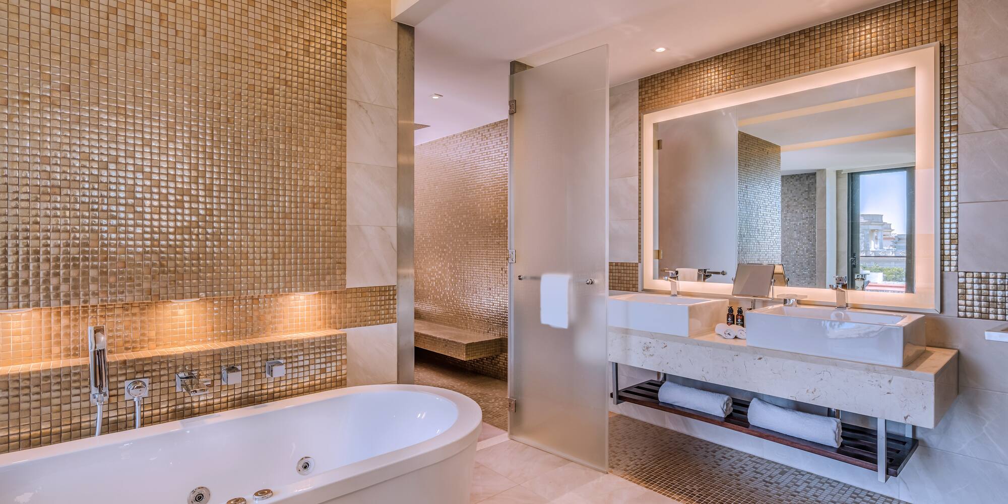 a bathroom with a tub and sink