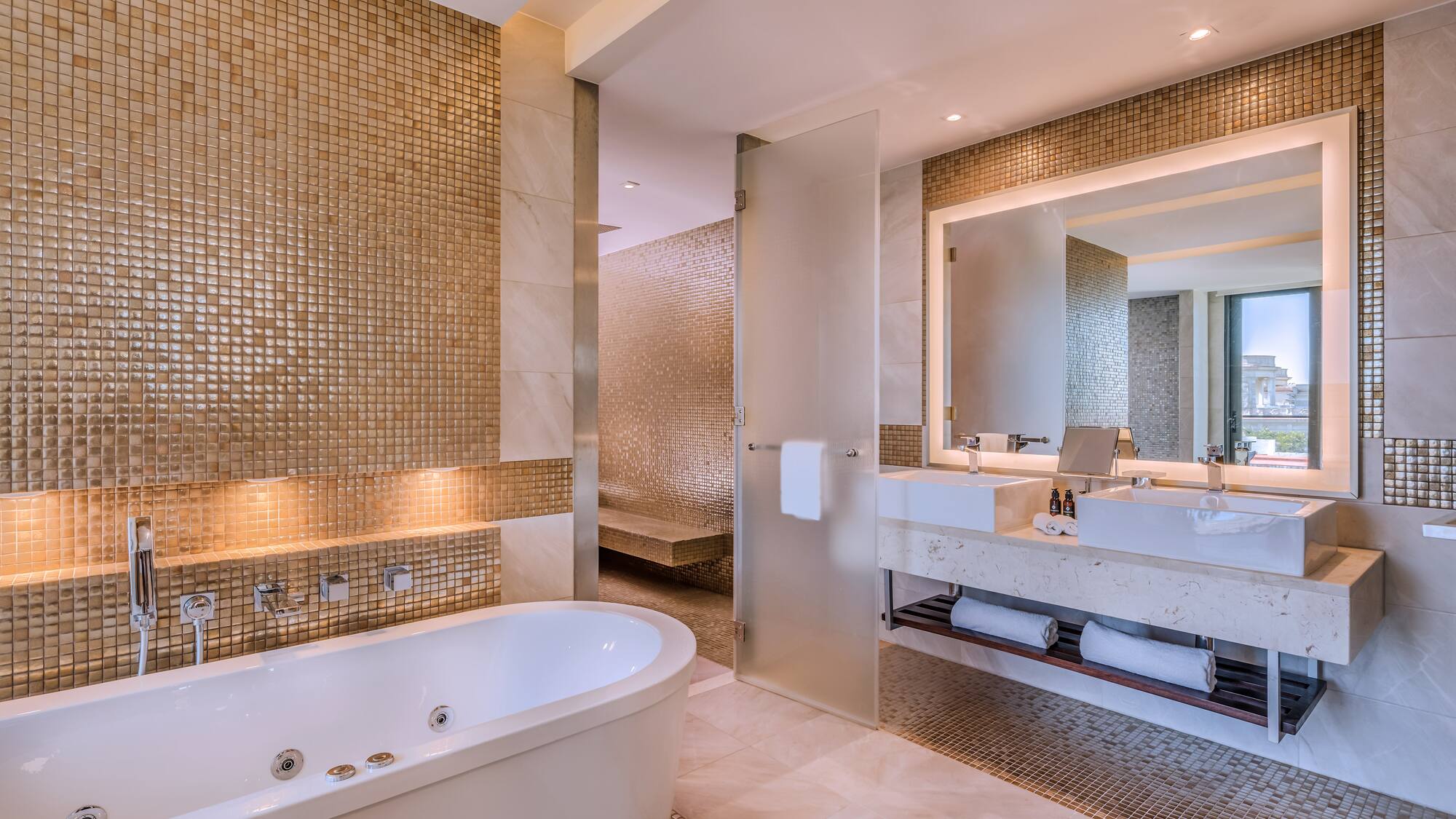 a bathroom with a tub and sink