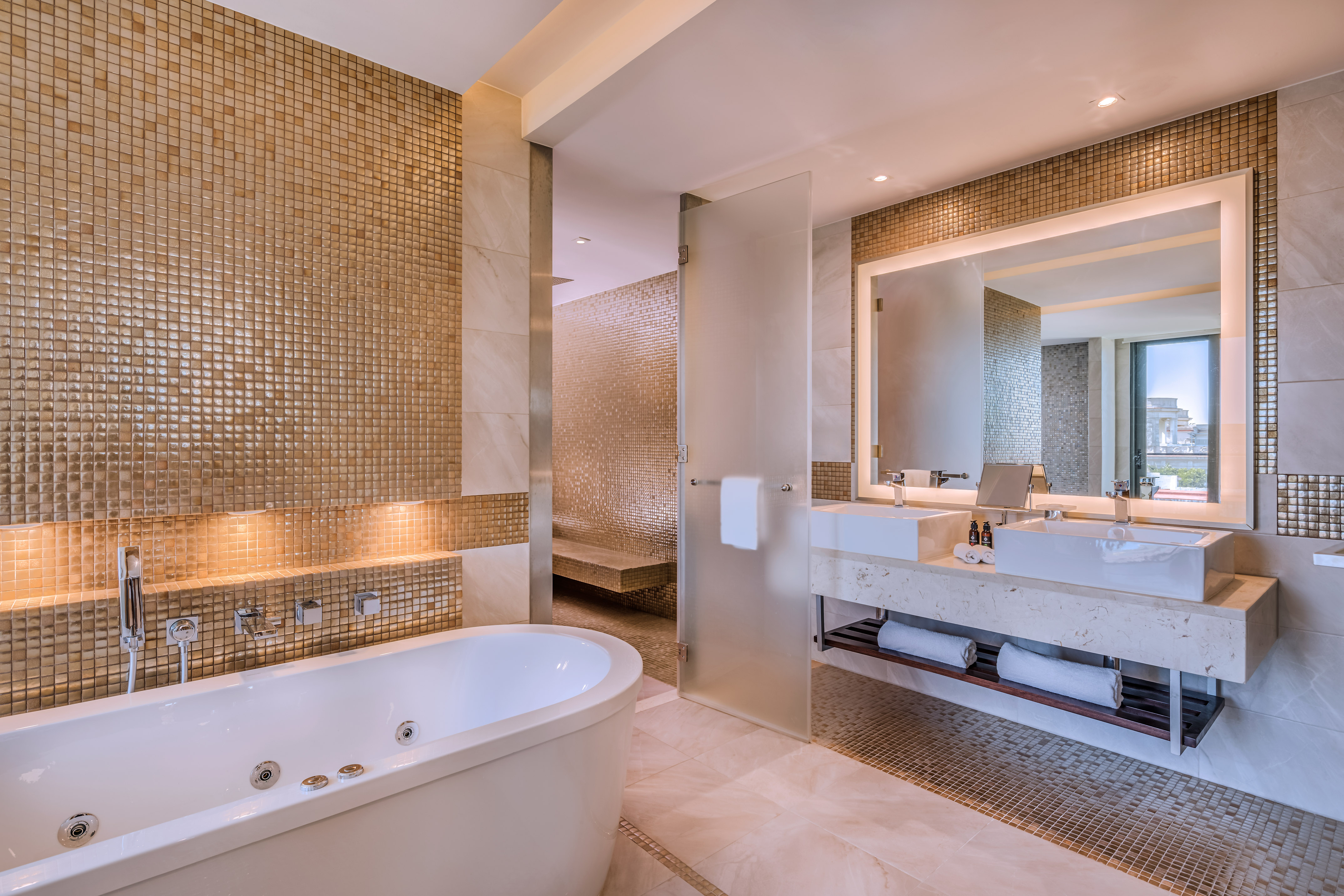 a bathroom with a tub and sink