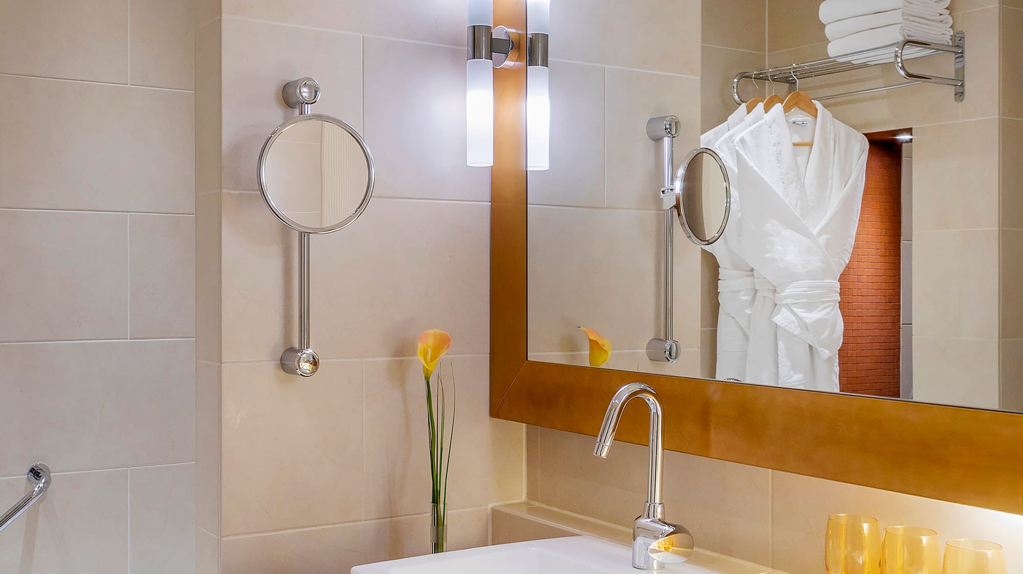 a bathroom with a mirror and sink
