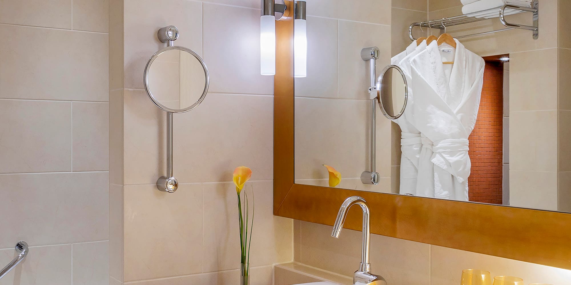 a bathroom with a mirror and sink