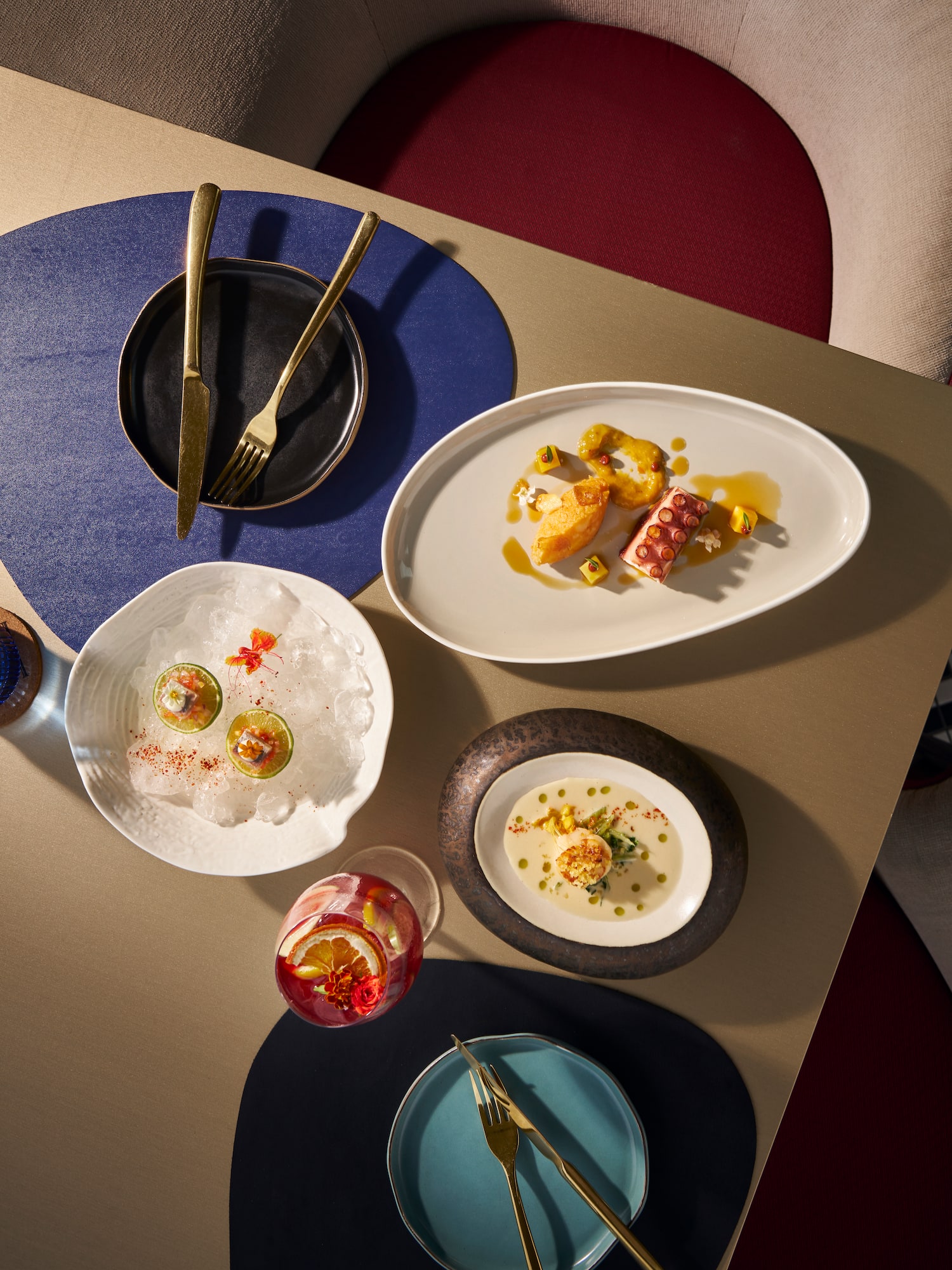 a table with plates and utensils