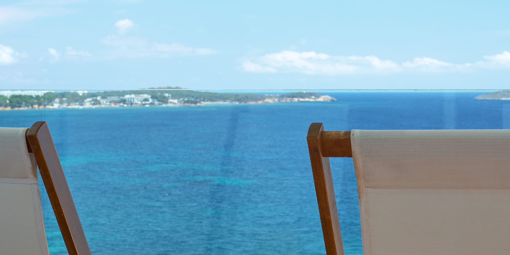 chairs and a table with a hat on it