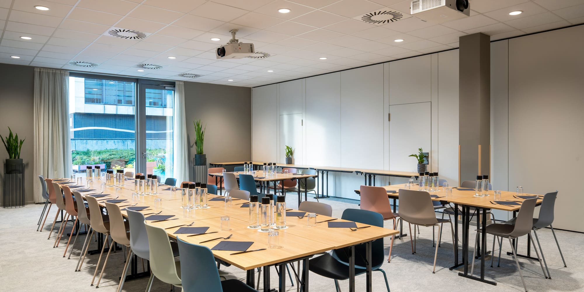 a room with tables and chairs