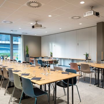 a room with tables and chairs