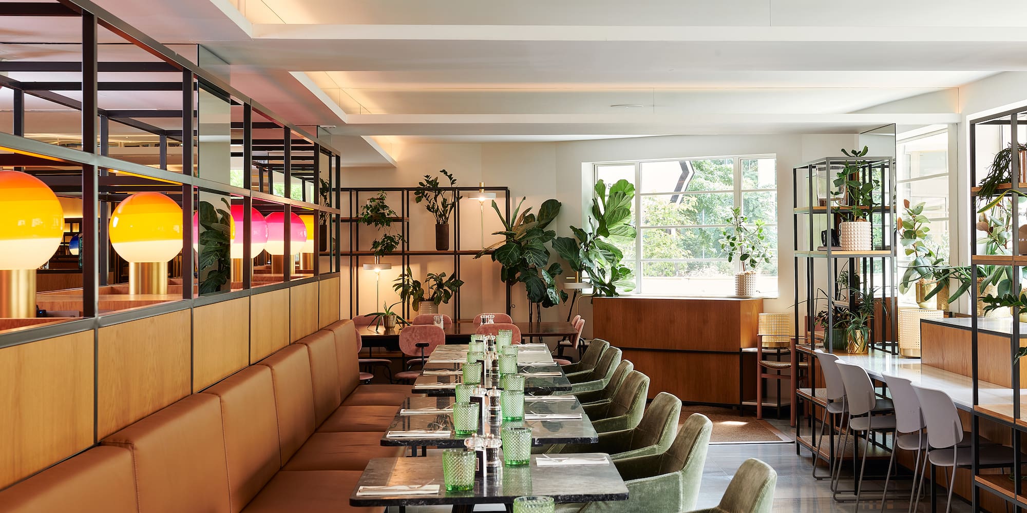 a restaurant with tables and chairs