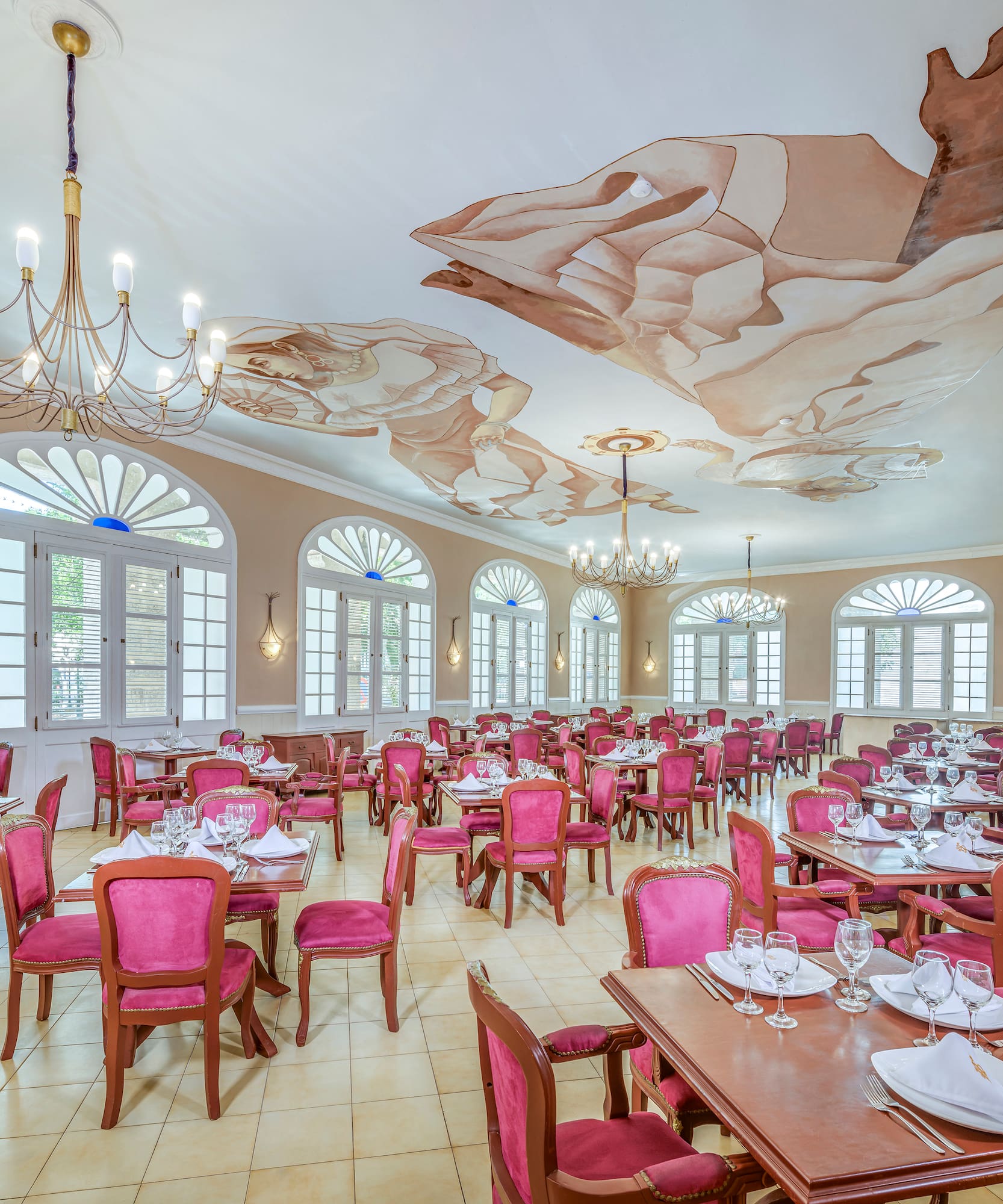 a room with tables and chairs