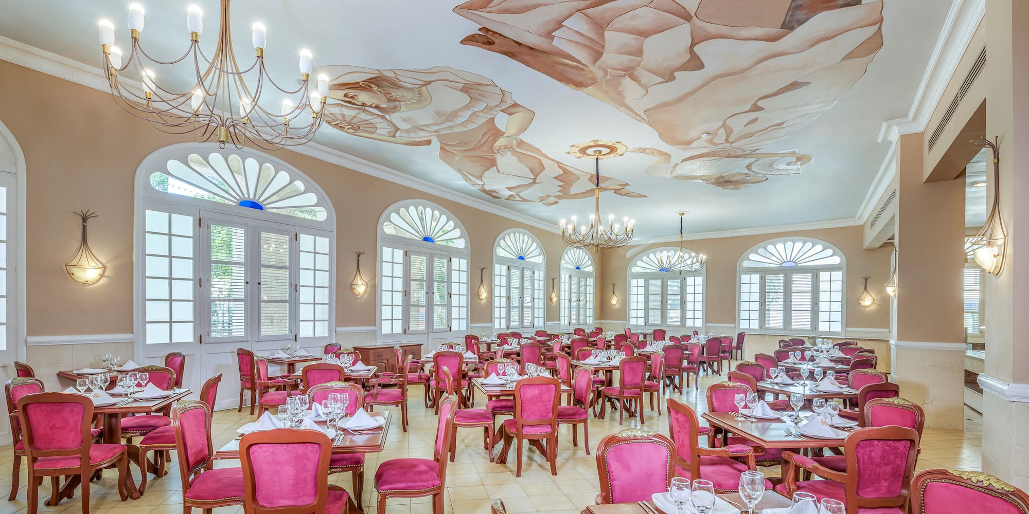 a room with tables and chairs