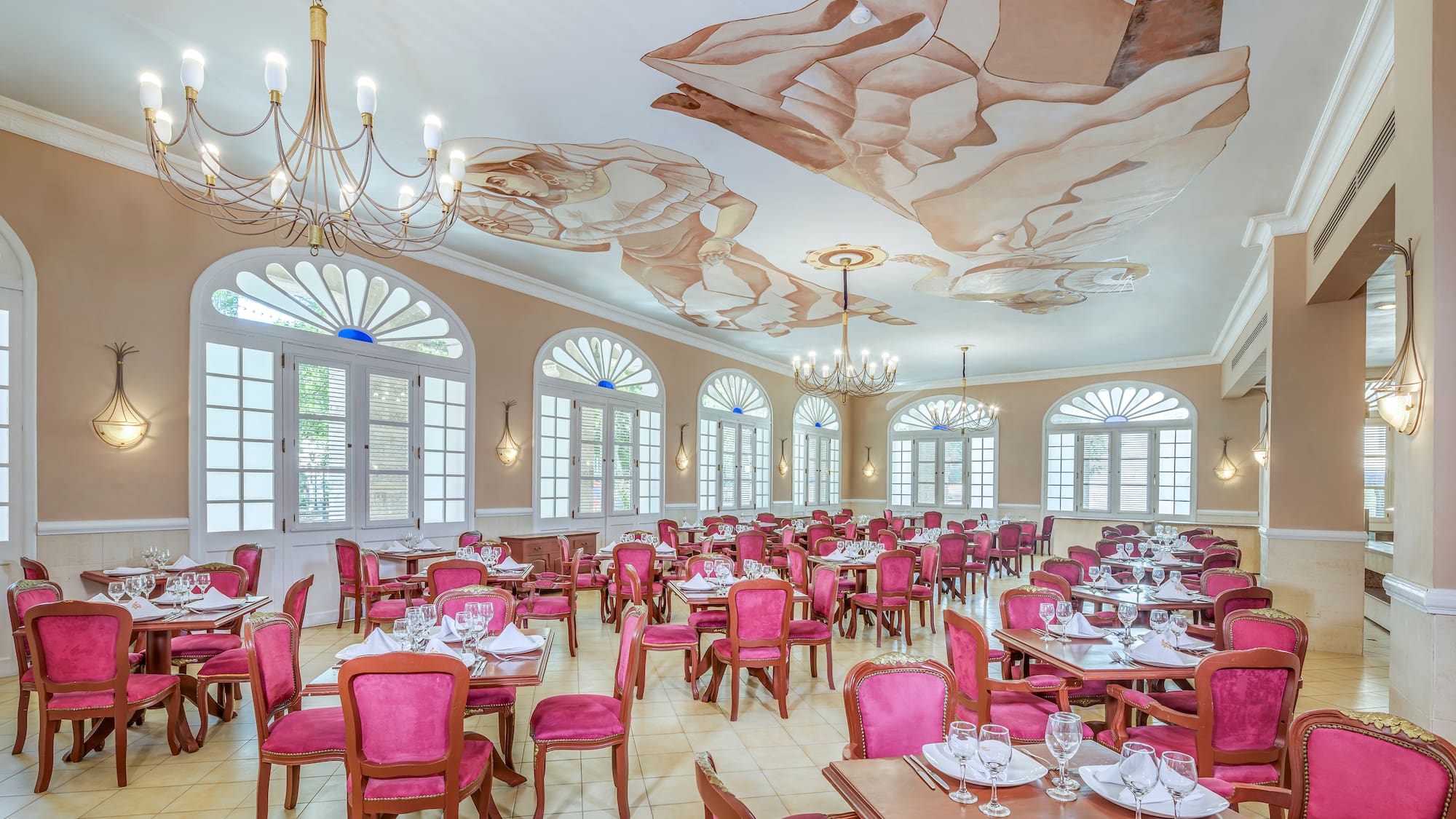 a room with tables and chairs