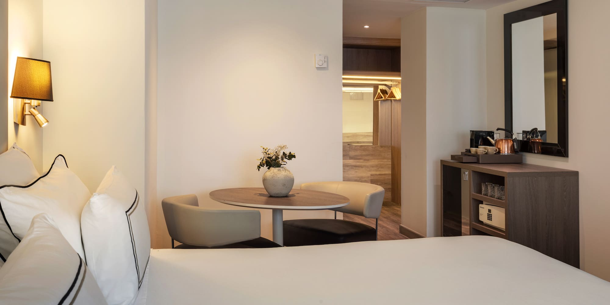 a room with a bed and a table