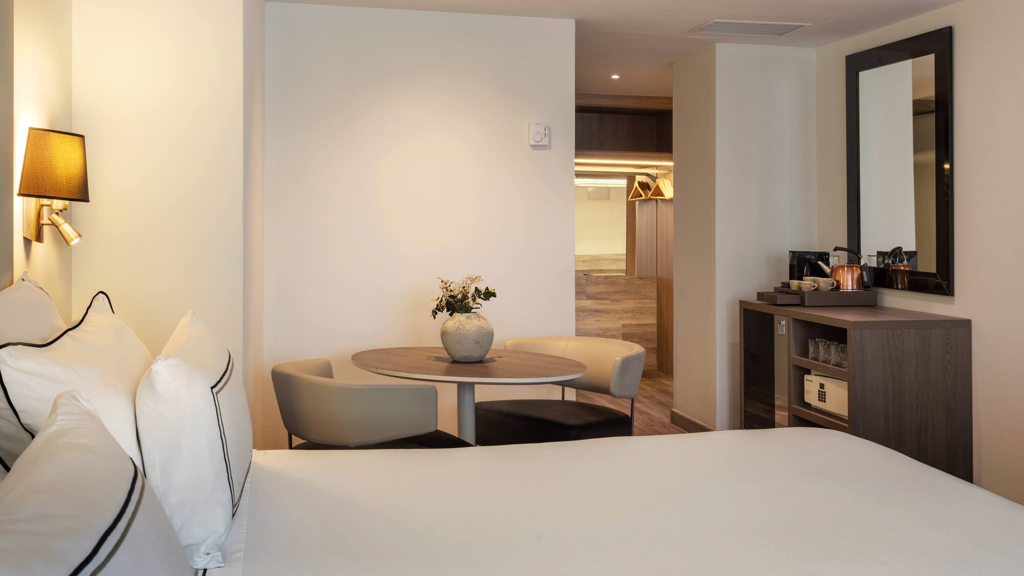 a room with a bed and a table