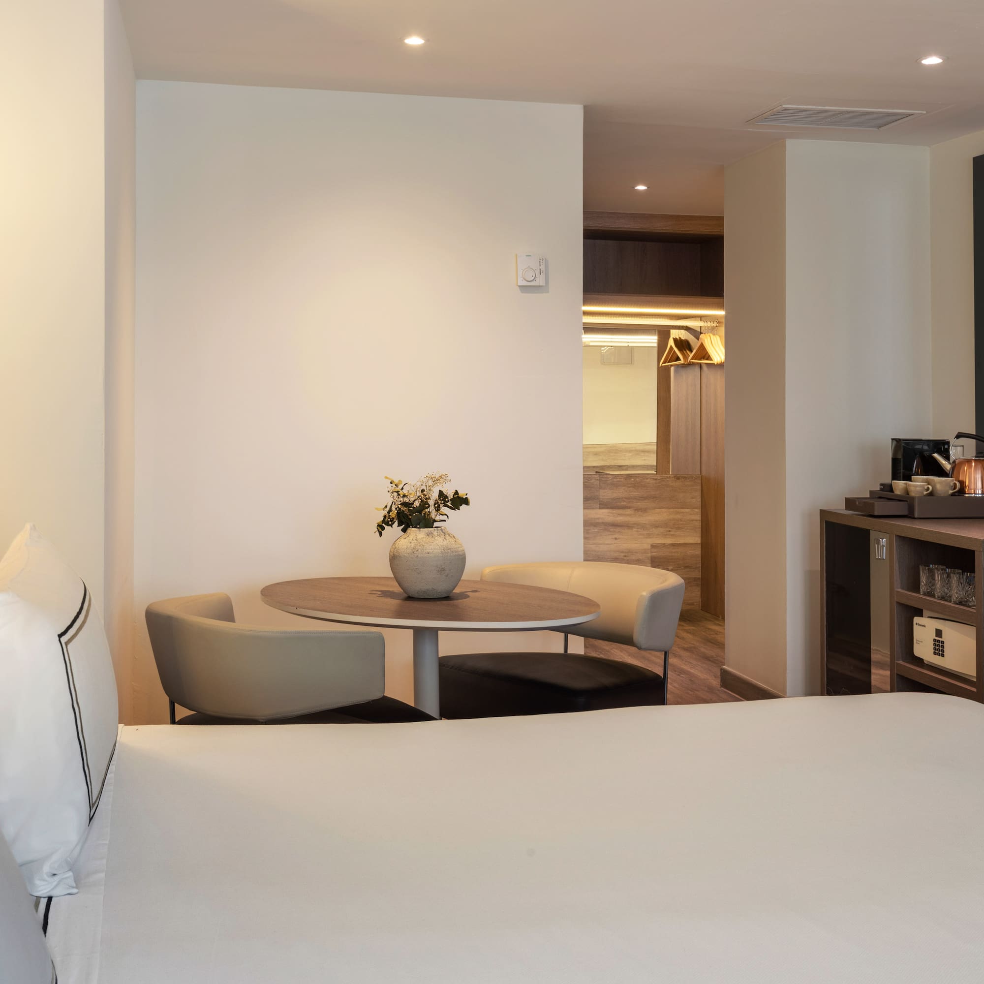 a room with a bed and a table