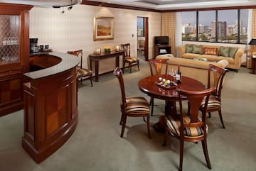 a room with a table and chairs