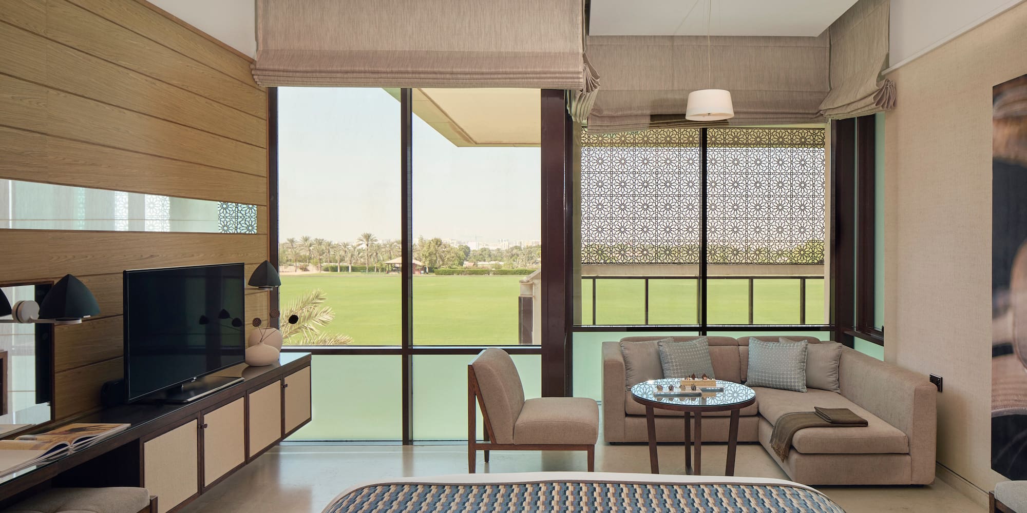 a room with a television and a bed