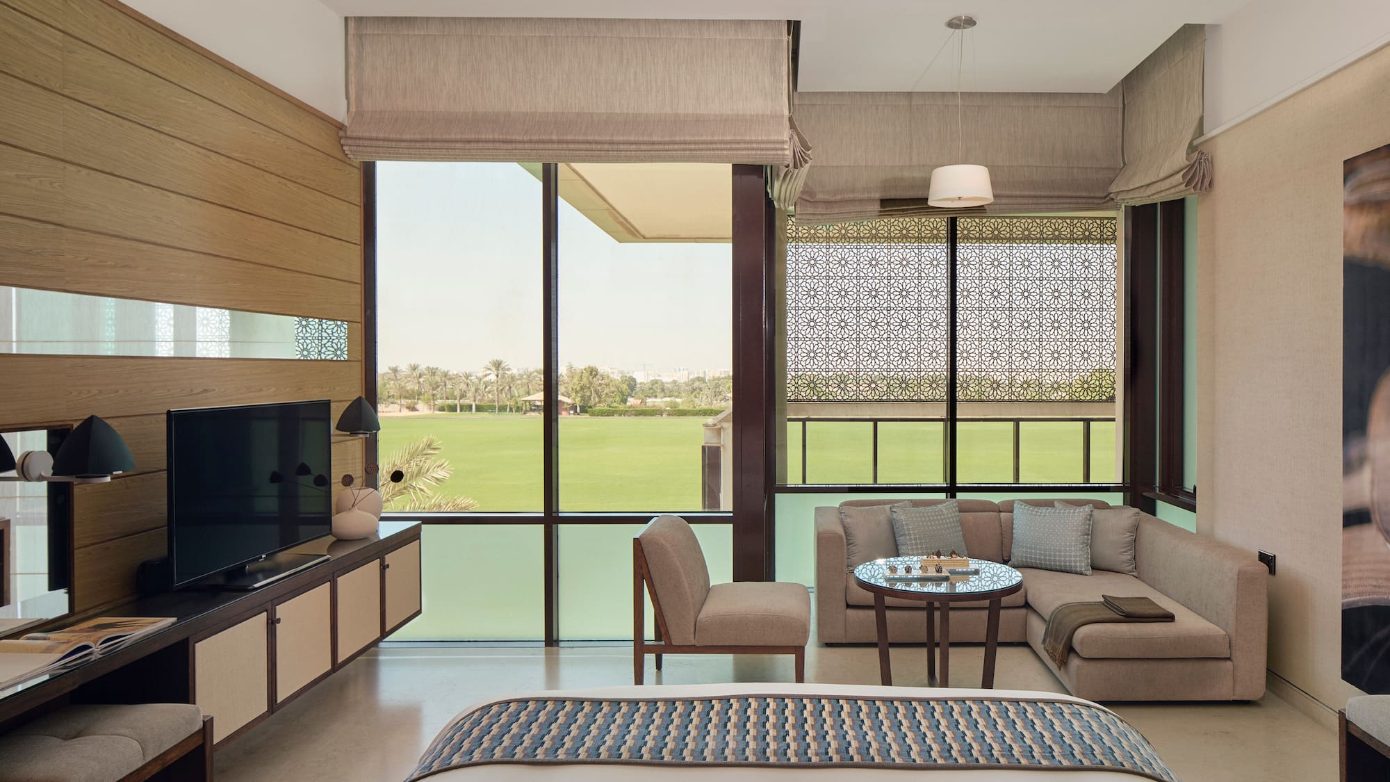 a room with a television and a bed